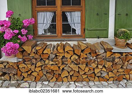 "Wood pile in front of a window, Garmisch-Partenkirchen, Bavaria, Germany, Europe" View Large Photo Image Stock Image - "Wood pile in front of a window, Garmisch-Partenkirchen, Bavaria, Germany, Europe". Fotosearch