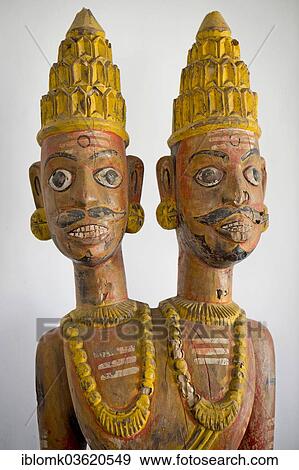 "Wood sculpture with two male heads, Kochi, Kerala, India, Asia" View Large Photo Image Stock Photo - "Wood sculpture with two male heads, Kochi, Kerala, India, Asia". Fotosearch