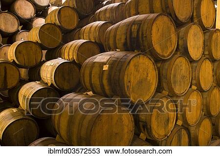 Stock Image - "Wooden barrels with tequila, Jose Cuervo Tequila Distillery, Tequila, Jalisco, Mexico, North America". Fotosearch