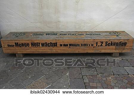 "Wooden bench with a note """"Ohne Wald kein Platz zum Ausruhen"""", English for """"without forests, there is no place to rest"""", eye-catching artwork, in Kirchplatz square of Biberach, Upper Swabia, Baden-Wuerttemberg, Germany, Europe" View Large Photo Image Picture - "Wooden bench with a note """"Ohne Wald kein Platz zum Ausruhen"""", English for """"without forests, there is no place to rest"""", eye-catching artwork, in Kirchplatz square of Biberach, Upper Swabia, Baden-Wuerttemberg, Germany, Europe". Fotosearch