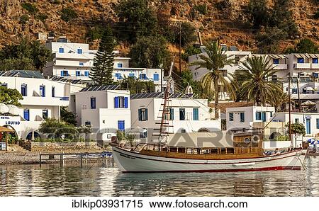 "Wooden boat in the harbour, Loutro, Chania, Crete, Greece, Europe" View Large Photo Image Stock Photography - "Wooden boat in the harbour, Loutro, Chania, Crete, Greece, Europe". Fotosearch