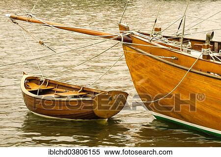"Wooden boats, boat with a dinghy, Gluckstadt, Schleswig-Holstein, Germany, Europe" View Large Photo Image Stock Photography - "Wooden boats, boat with a dinghy, Gluckstadt, Schleswig-Holstein, Germany, Europe". Fotosearch