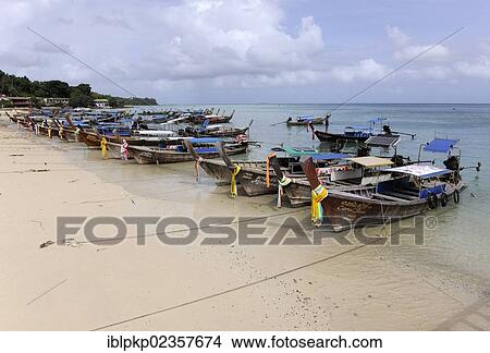 "Wooden boats on Phi Phi Island, Krabi, Thailand, Asia" View Large Photo Image Picture - "Wooden boats on Phi Phi Island, Krabi, Thailand, Asia". Fotosearch