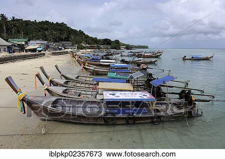 "Wooden boats on Phi Phi Island, Krabi, Thailand, Asia" View Large Photo Image Stock Image - "Wooden boats on Phi Phi Island, Krabi, Thailand, Asia". Fotosearch