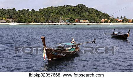 "Wooden boats on Phi Phi Island, Krabi, Thailand, Asia" View Large Photo Image Stock Photo - "Wooden boats on Phi Phi Island, Krabi, Thailand, Asia". Fotosearch