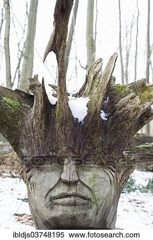 Stock Photography - "Wooden carved face, Freiburg im Breisgau, Baden-Wurttemberg, Germany, Europe". Fotosearch