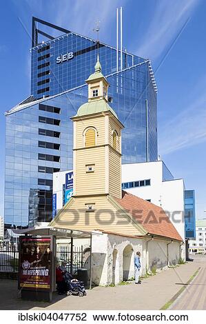 "Wooden church in front of modern building of SEB bank in the financial and business district, Tallinn, Estonia, Europe" View Large Photo Image Stock Image - "Wooden church in front of modern building of SEB bank in the financial and business district, Tallinn, Estonia, Europe". Fotosearch