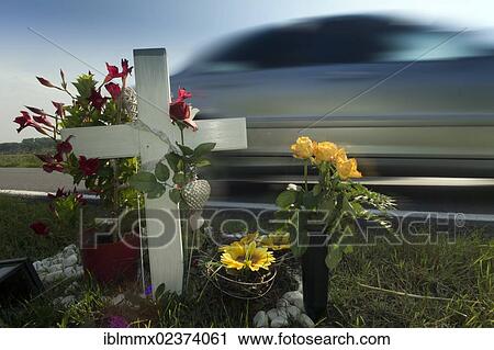 "Wooden cross on a roadside, in commemoration of the victim of a traffic accident, Germany, Europe" View Large Photo Image Stock Image - "Wooden cross on a roadside, in commemoration of the victim of a traffic accident, Germany, Europe". Fotosearch