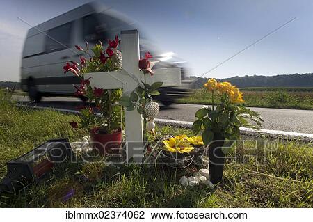 "Wooden cross on a roadside, in commemoration of the victim of a traffic accident, Germany, Europe" View Large Photo Image Stock Image - "Wooden cross on a roadside, in commemoration of the victim of a traffic accident, Germany, Europe". Fotosearch