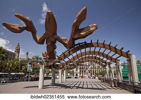 "Wooden figure on the promenade of Passeig de Colom, Barcelona, Catalonia, Spain, Europe, PublicGround, Europe" View Large Photo Image Stock Photography - "Wooden figure on the promenade of Passeig de Colom, Barcelona, Catalonia, Spain, Europe, PublicGround, Europe". Fotosearch