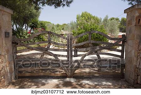 "Wooden gate near Calo des Moro, Santanyi, Mallorca, Majorca, Balearic Islands, Spain, Europe" View Large Photo Image Stock Image - "Wooden gate near Calo des Moro, Santanyi, Mallorca, Majorca, Balearic Islands, Spain, Europe". Fotosearch