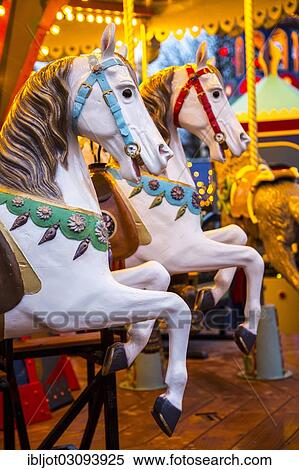 Wooden horses on a historic funfair carousel View Large Photo Image Stock Photography - Wooden horses on a historic funfair carousel. Fotosearch