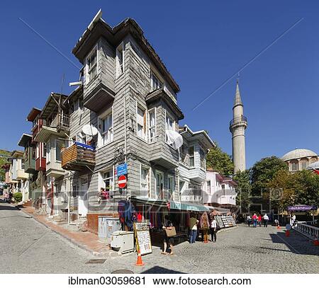 Stock Image - "Wooden houses with bay windows, Chora Church or Kariye Camii at back right, Edirnekapi, Fatih, Istanbul, Istanbul Province, Turkey, Asia". Fotosearch