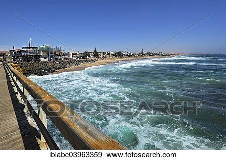 Stock Photo - "Wooden jetty and beach, Swakopmund, Namibia, Africa". Fotosearch