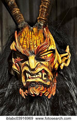 "Wooden mask, Krampus, a beast-like creature, special exhibition on the tradition of the Krampuslauf run, Deutsches Jagd- und Fischereimuseum, German Hunting and Fishing Museum, Munich, Bavaria, Germany, Europe" View Large Photo Image Stock Photo - "Wooden mask, Krampus, a beast-like creature, special exhibition on the tradition of the Krampuslauf run, Deutsches Jagd- und Fischereimuseum, German Hunting and Fishing Museum, Munich, Bavaria, Germany, Europe". Fotosearch