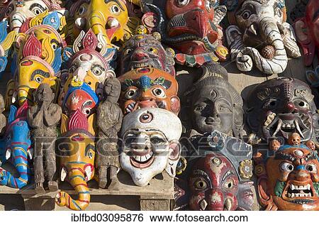 Stock Photograph - "Wooden masks sold as souvenirs in Durbar Square, Kathmandu Valley, Kathmandu, Kathmandu District, Bagmati Zone, Nepal, Asia". Fotosearch