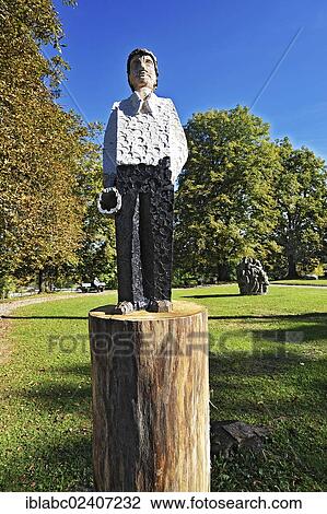 "Wooden sculpture, depicting John Roessle, a local, Symposium Kunst und Bier, Andechs, Bavaria, Germany, Europe" View Large Photo Image Stock Image - "Wooden sculpture, depicting John Roessle, a local, Symposium Kunst und Bier, Andechs, Bavaria, Germany, Europe". Fotosearch
