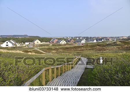 "Wooden staircase, boardwalk, village of Rantum at back, Rantum, Sylt, North Frisian Islands, Schleswig-Holstein, Germany, Europe" View Large Photo Image Stock Photo - "Wooden staircase, boardwalk, village of Rantum at back, Rantum, Sylt, North Frisian Islands, Schleswig-Holstein, Germany, Europe". Fotosearch
