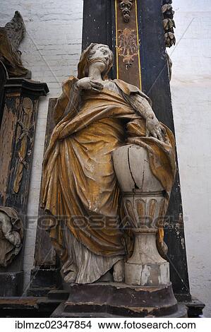 "Wooden statue of a woman with a tied up mouth, grave, St. Marienkirche church, Brueggstrasse street 35, Greifswald, Mecklenburg-Western Pomerania, Germany, Europe" View Large Photo Image Picture - "Wooden statue of a woman with a tied up mouth, grave, St. Marienkirche church, Brueggstrasse street 35, Greifswald, Mecklenburg-Western Pomerania, Germany, Europe". Fotosearch