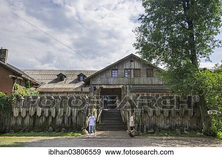 Stock Photo - "Wooden warrior figures at the entrance, Mazurski Eden or Masurian Garden of Eden, reconstruction of Galindian culture, Gmina Ruciane-Nida, Warmian-Masurian Voivodeship, Poland, Europe". Fotosearch