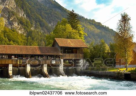"Wooden weir, Interlaken, Bernese Alps, Switzerland, Europe" View Large Photo Image Stock Photograph - "Wooden weir, Interlaken, Bernese Alps, Switzerland, Europe". Fotosearch