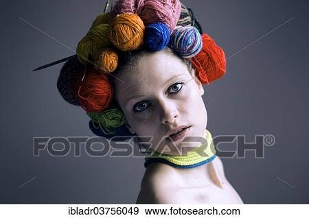 "Woollen head, woman with balls of wool or yarn on her head as a headdress" View Large Photo Image Stock Photo - "Woollen head, woman with balls of wool or yarn on her head as a headdress". Fotosearch
