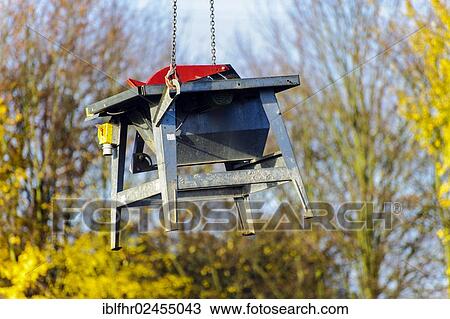 "Workbench for workers on building sites being suspended from a crane, anti-theft protection, Grevenbroich, North Rhine-Westphalia, Germany, Europe" View Large Photo Image Stock Image - "Workbench for workers on building sites being suspended from a crane, anti-theft protection, Grevenbroich, North Rhine-Westphalia, Germany, Europe". Fotosearch