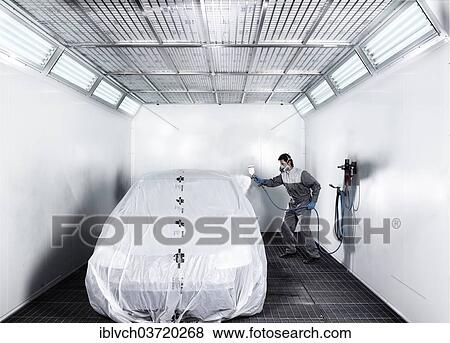"Worker spray-painting a car, paint shop, car repair shop, St. Gertraudi, Reith im Alpbachtal, Kufstein District, North Tirol, Tirol, Austria, Europe" View Large Photo Image Stock Photo - "Worker spray-painting a car, paint shop, car repair shop, St. Gertraudi, Reith im Alpbachtal, Kufstein District, North Tirol, Tirol, Austria, Europe". Fotosearch
