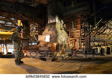 "Worker working at a melting furnace in the dated and derelict Doe Run ironworks, La Oroya, Junin, Peru, South America" View Large Photo Image Stock Image - "Worker working at a melting furnace in the dated and derelict Doe Run ironworks, La Oroya, Junin, Peru, South America". Fotosearch