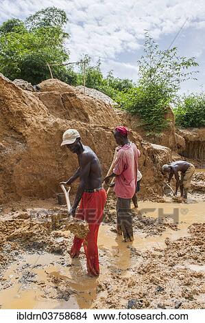 "Workers digging at a diamond mine in the jungle, Kenema, Eastern Province, Sierra Leone, Africa" View Large Photo Image Picture - "Workers digging at a diamond mine in the jungle, Kenema, Eastern Province, Sierra Leone, Africa". Fotosearch