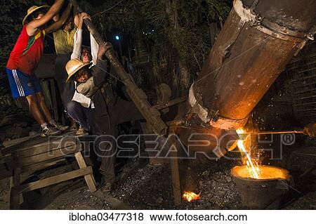 "Workers in a foundry, Nyaung Shwe, Shan State, Myanmar, Burma, Asia" View Large Photo Image Stock Photo - "Workers in a foundry, Nyaung Shwe, Shan State, Myanmar, Burma, Asia". Fotosearch