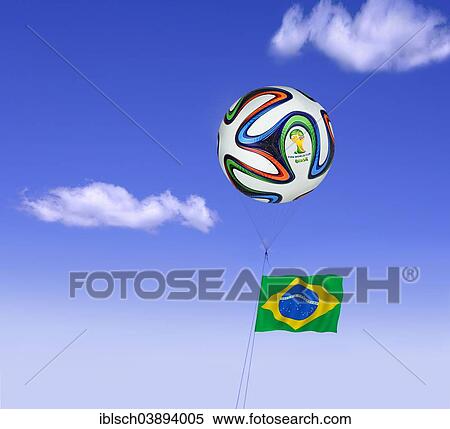 World Cup football as a tethered balloon against a blue sky with the flag of Brazil flying View Large Photo Image Stock Photography - World Cup football as a tethered balloon against a blue sky with the flag of Brazil flying. Fotosearch