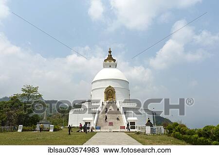 Stock Image - "World Peace Stupa, new white stupa, Pokhara, Nepal, Asia". Fotosearch