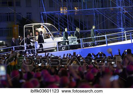 "World Youth Day 2013, Pope Francis travelling in the """"Popemobile"""" to the stage where he will celebrate Mass, Copacabana, Rio de Janeiro, Rio de Janeiro State, Brazil, South America" View Large Photo Image Stock Image - "World Youth Day 2013, Pope Francis travelling in the """"Popemobile"""" to the stage where he will celebrate Mass, Copacabana, Rio de Janeiro, Rio de Janeiro State, Brazil, South America". Fotosearch