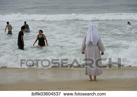 "World Youth Day, 2013, Sister looking out to the sea, Copacabana, Rio de Janeiro, Rio de Janeiro State, Brazil, South America" View Large Photo Image Stock Photo - "World Youth Day, 2013, Sister looking out to the sea, Copacabana, Rio de Janeiro, Rio de Janeiro State, Brazil, South America". Fotosearch