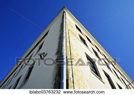 "Worn corner of a house against a blue sky, Munich, Upper Bavaria, Bavaria, Germany, Europe" View Large Photo Image Stock Image - "Worn corner of a house against a blue sky, Munich, Upper Bavaria, Bavaria, Germany, Europe". Fotosearch