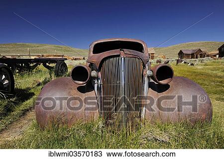 Stock Image - "Wreck of a 1937 Chevrolet, rusted, Bodie State Historic Park, Bodie, California, United States, North America". Fotosearch