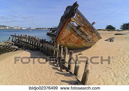 "Wreck of an old wooden ship at the banks of river Etel, southern Brittany, Bretagne, France, Europe" View Large Photo Image Stock Photo - "Wreck of an old wooden ship at the banks of river Etel, southern Brittany, Bretagne, France, Europe". Fotosearch