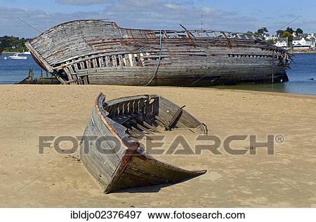 "Wrecks of two old wooden ships at the banks of river Etel, southern Brittany, Bretagne, France, Europe" View Large Photo Image Stock Photo - "Wrecks of two old wooden ships at the banks of river Etel, southern Brittany, Bretagne, France, Europe". Fotosearch