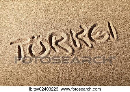"Writing in the sand """"TURKEI"""" or """"TURKEY""""" View Large Photo Image Stock Image - "Writing in the sand """"TURKEI"""" or """"TURKEY""""". Fotosearch