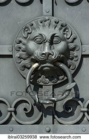 "Wrought iron door knocker, lion head, outer wall, Bavarian National Museum, Bayerisches Nationalmuseum, Prinzregentenstrasse, Munich, Upper Bavaria, Bavaria, Germany, Europe" View Large Photo Image Stock Photo - "Wrought iron door knocker, lion head, outer wall, Bavarian National Museum, Bayerisches Nationalmuseum, Prinzregentenstrasse, Munich, Upper Bavaria, Bavaria, Germany, Europe". Fotosearch