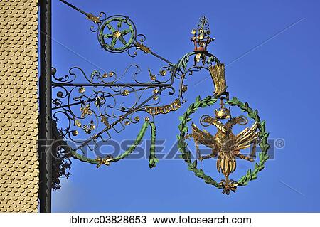 "Wrought iron signboard of the Gasthaus Goldener Adler or Golden Eagle guesthouse, Weitnau, Upper Allgau, Bavaria, Germany, Europe" View Large Photo Image Stock Image - "Wrought iron signboard of the Gasthaus Goldener Adler or Golden Eagle guesthouse, Weitnau, Upper Allgau, Bavaria, Germany, Europe". Fotosearch