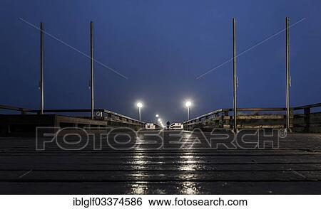 Stock Photograph - "Wustrow Pier at night, Wustrow, Mecklenburg-Western Pomerania, Germany, Europe". Fotosearch