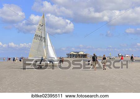 "Yacht and stilt house with Strandbar 54 beach club on the beach of St. Peter-Ording, Eiderstedt, Schleswig-Holstein, Germany, Europe" View Large Photo Image Stock Image - "Yacht and stilt house with Strandbar 54 beach club on the beach of St. Peter-Ording, Eiderstedt, Schleswig-Holstein, Germany, Europe". Fotosearch