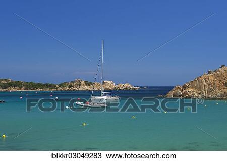 Stock Image - "Yachts in a bay, La Maddalena, Sardinia, Italy, Europe". Fotosearch