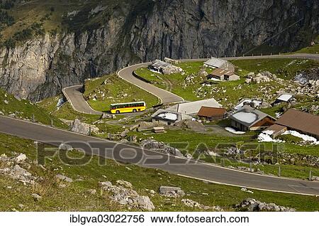 "Yellow bus from the PostAuto Schweiz AG in a hamlet on the serpentine-rich Klausen Pass road, Canton of Uri, Switzerland, Europe" View Large Photo Image Stock Photograph - "Yellow bus from the PostAuto Schweiz AG in a hamlet on the serpentine-rich Klausen Pass road, Canton of Uri, Switzerland, Europe". Fotosearch