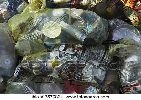 "Yellow garbage bags, recycling sacks for the collection of recyclable packaging material, Biberach an der Riss, Upper Swabia, Baden-Wurttemberg, Germany, Europe" View Large Photo Image Picture - "Yellow garbage bags, recycling sacks for the collection of recyclable packaging material, Biberach an der Riss, Upper Swabia, Baden-Wurttemberg, Germany, Europe". Fotosearch