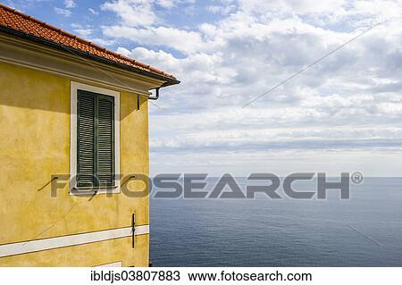 "Yellow house by the sea, Cervo, Liguria, Italy, Europe" View Large Photo Image Stock Image - "Yellow house by the sea, Cervo, Liguria, Italy, Europe". Fotosearch