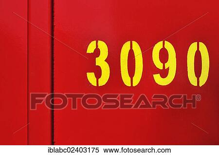Stock Photography - "Yellow number 3090 on red, Germany, Europe". Fotosearch