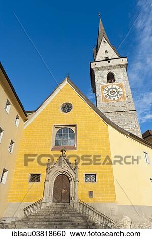 "Yellow painted church with a bell tower, St. Ursuline Church, historic town centre of Brunico, Alto Adige, Trentino-Alto Adige, Italy, Europe" View Large Photo Image Stock Image - "Yellow painted church with a bell tower, St. Ursuline Church, historic town centre of Brunico, Alto Adige, Trentino-Alto Adige, Italy, Europe". Fotosearch